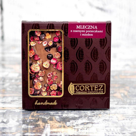 Czekolada mleczna z czarną porzeczką i miodem Cortez 85 g
