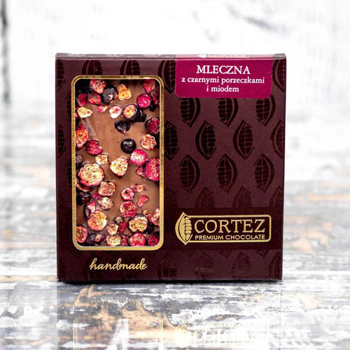 Czekolada mleczna z czarną porzeczką i miodem Cortez 85 g